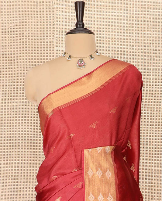 Crimson Red Banana Pith Saree Embellished with Zari Buttas, Temple Border of Zari Designs, Subtle Pallu of Zari Designs, and Paired with a Matching Blouse