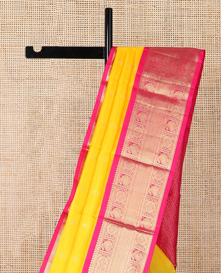 Yellow butta silk saree with contrast korvai zari design border & intricate zari design pallu