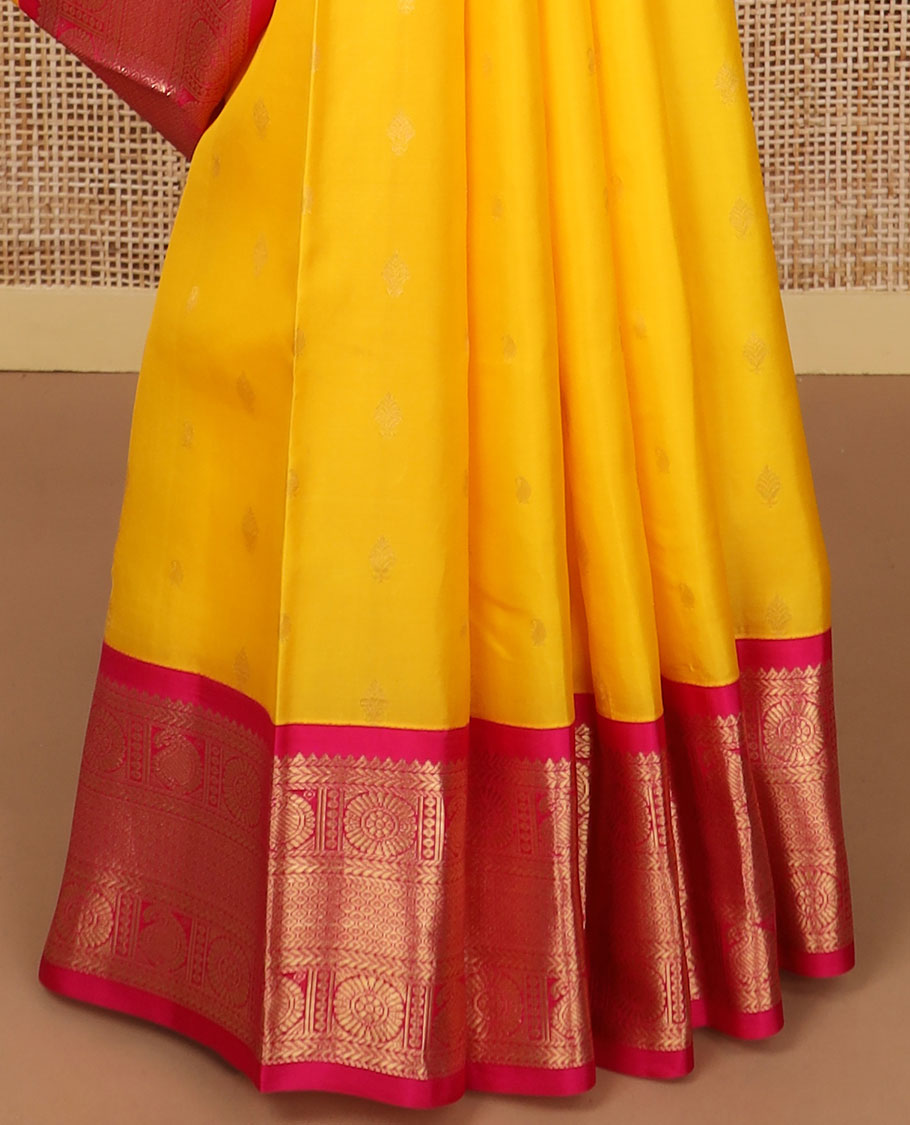 Yellow butta silk saree with contrast korvai zari design border & intricate zari design pallu