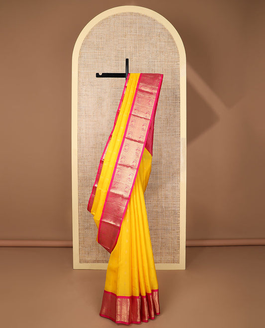 Yellow butta silk saree with contrast korvai zari design border & intricate zari design pallu