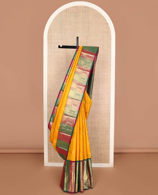 Orange buttas silk saree with contrast rekku, muthu, banaras, mayil design & floral design pallu