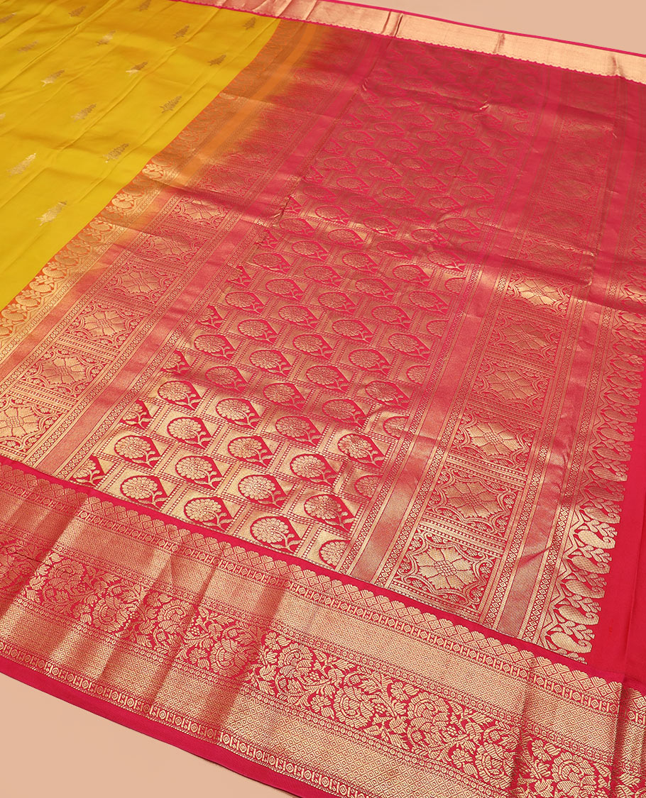 Yellow zari buttas silk saree, contrast border of mayil kann, and kodi visiry designs, and pallu of floral designs