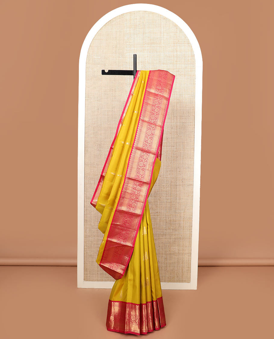 Yellow zari buttas silk saree, contrast border of mayil kann, and kodi visiry designs, and pallu of floral designs
