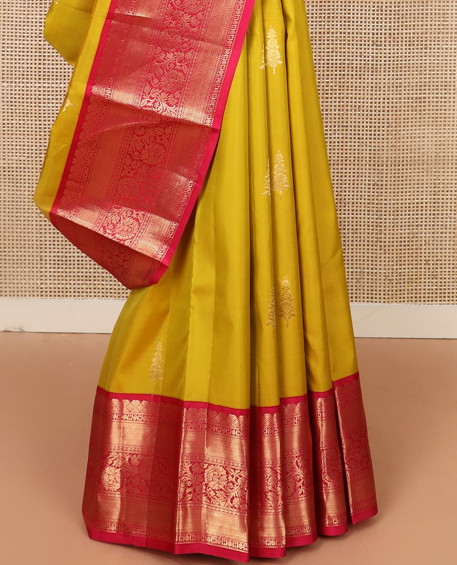 Yellow zari buttas silk saree, contrast border of mayil kann, and kodi visiry designs, and pallu of floral designs