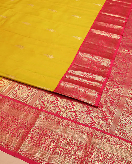 Yellow zari buttas silk saree, contrast border of mayil kann, and kodi visiry designs, and pallu of floral designs