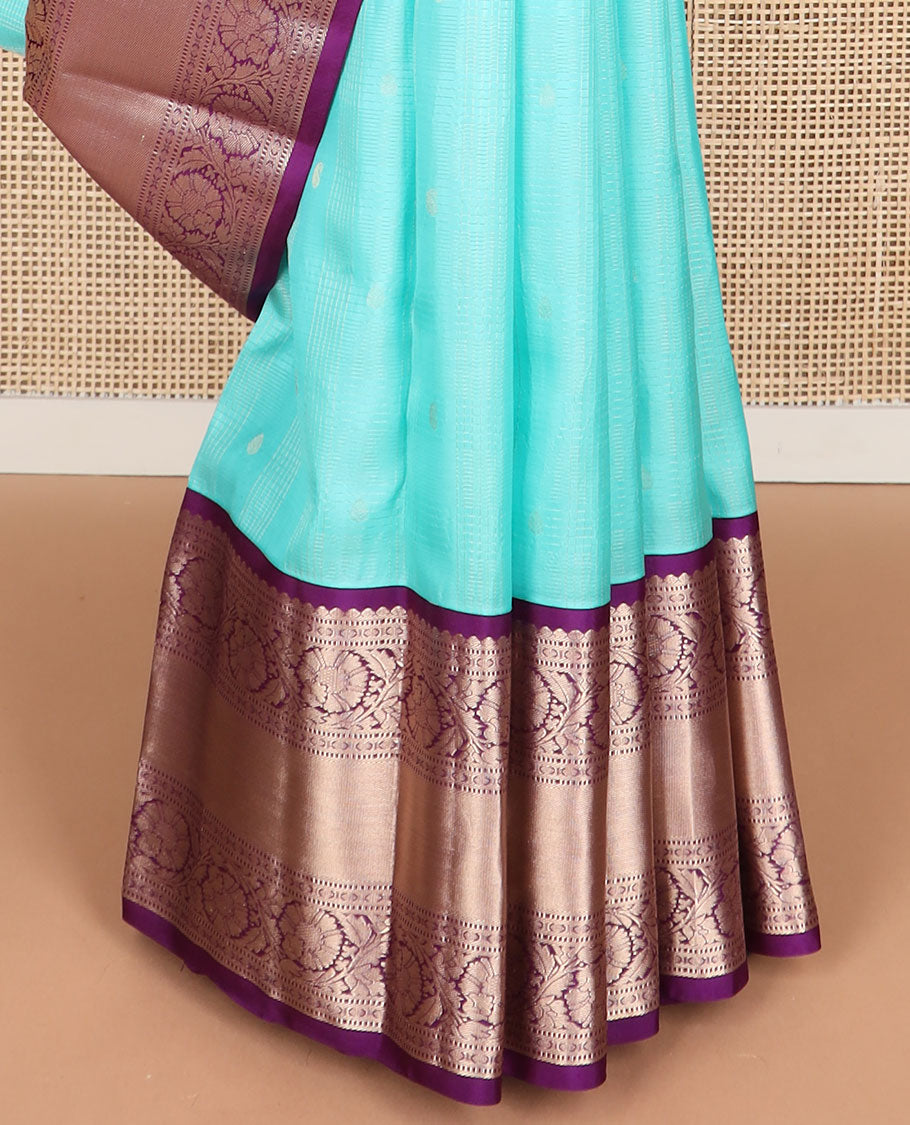 Light blue striped , buttas silk saree with contrast rettai pettu border of thilakam mokku, paun, muthu design & zari design pallu