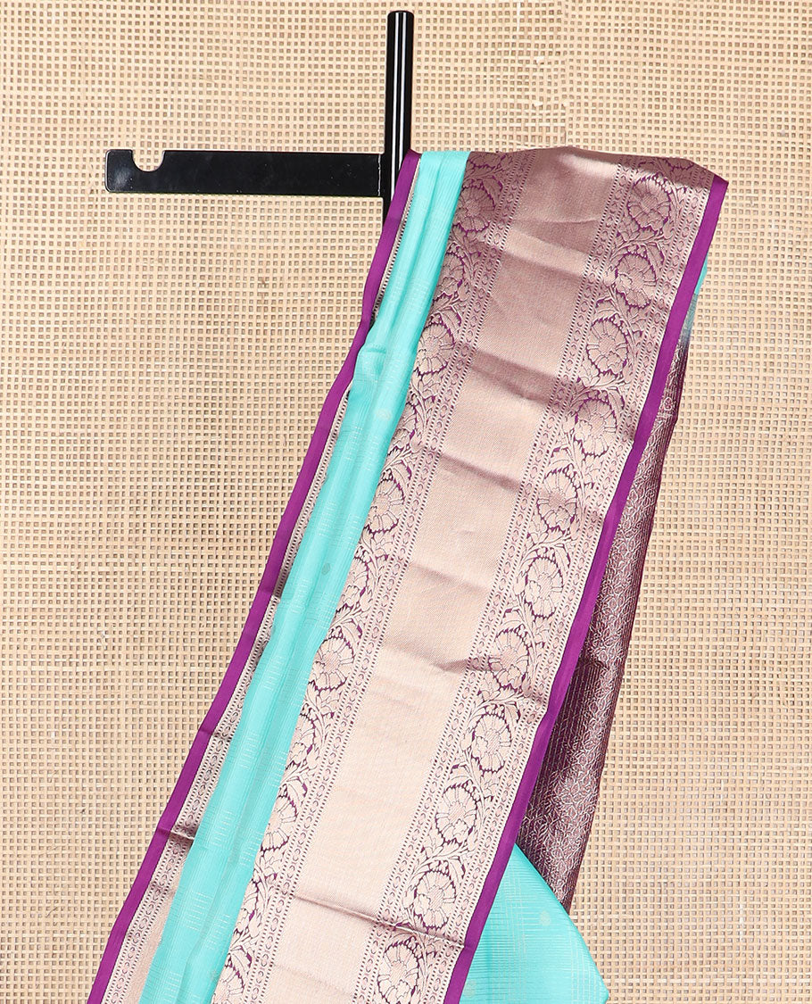 Light blue striped , buttas silk saree with contrast rettai pettu border of thilakam mokku, paun, muthu design & zari design pallu