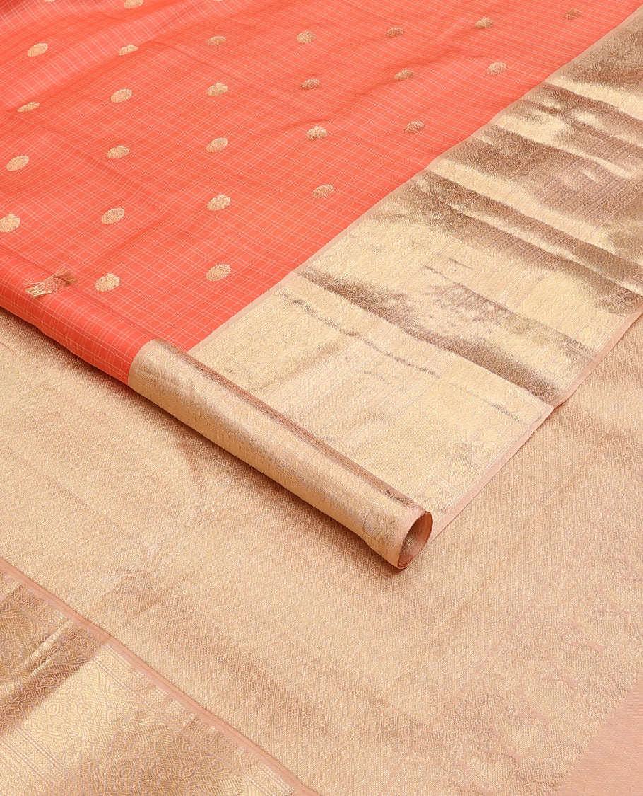 Peach checked annam chakram buttas silksaree, contrast jaal pallu & border of muthu, cross kamalam,mayil kann,neli & mayil designs