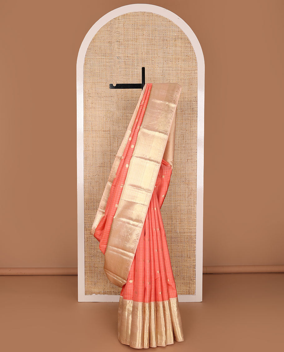 Peach checked annam chakram buttas silksaree, contrast jaal pallu & border of muthu, cross kamalam,mayil kann,neli & mayil designs