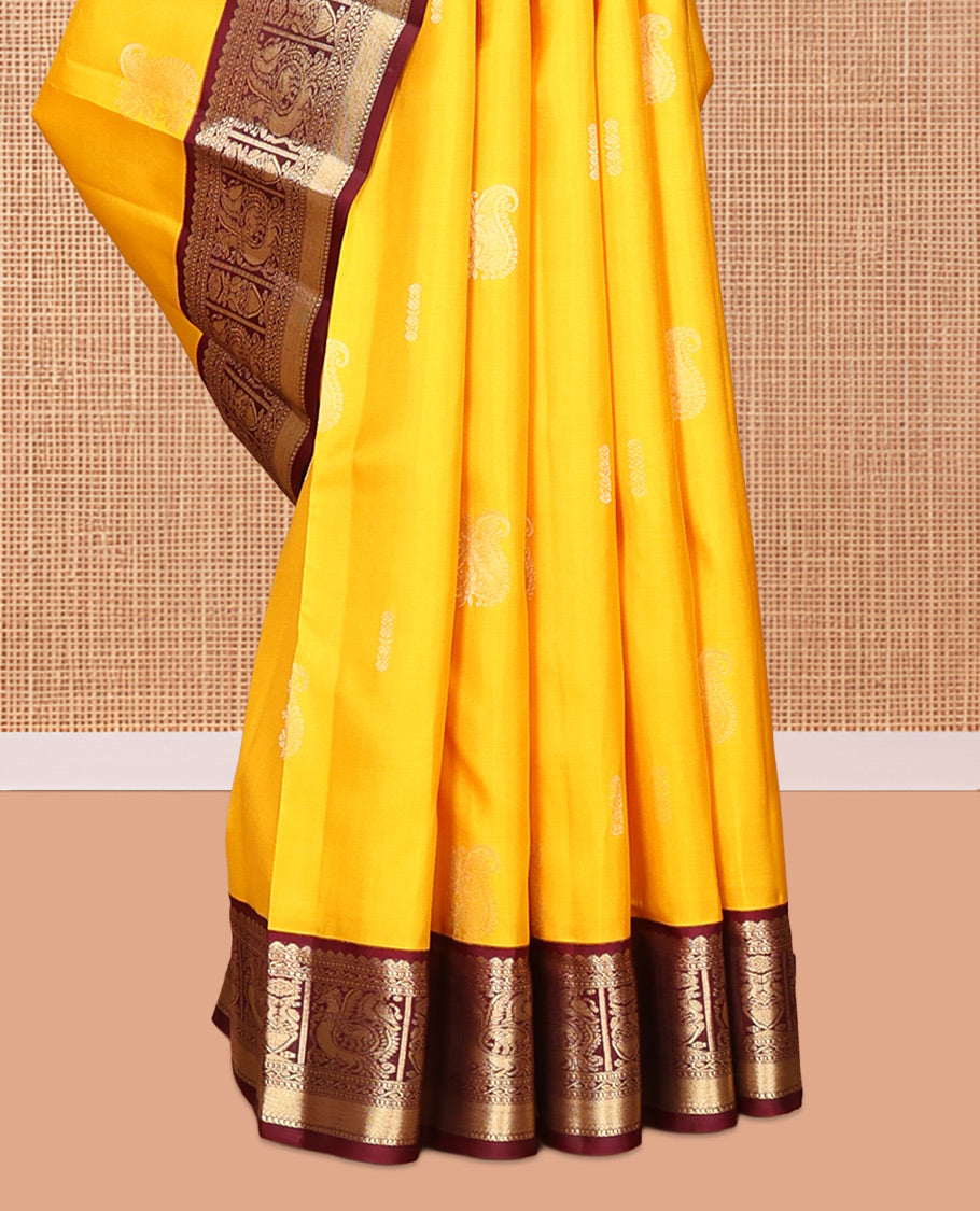 Yellow Vasundhara Silk Saree, Woven with Zari Buttas, Contrast Border of Muthu, Mayil, and Yaanai Designs, Grand Pallu, and Contrast Blouse