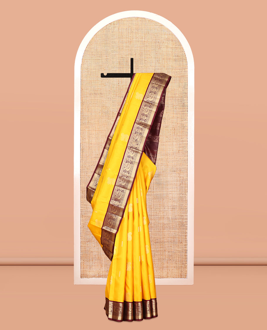 Yellow Vasundhara Silk Saree, Woven with Zari Buttas, Contrast Border of Muthu, Mayil, and Yaanai Designs, Grand Pallu, and Contrast Blouse