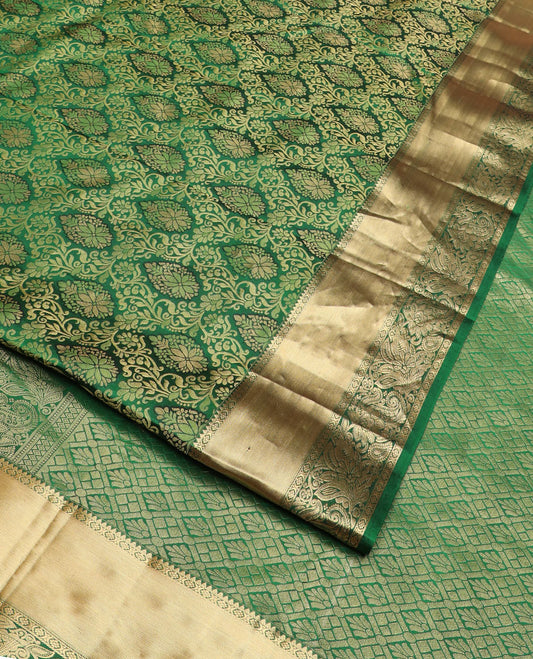 Green jacquard Kanchipuram wedding silk saree, zari border of rekku, laddu kamalam, and flora-paisley designs, and intricate pallu