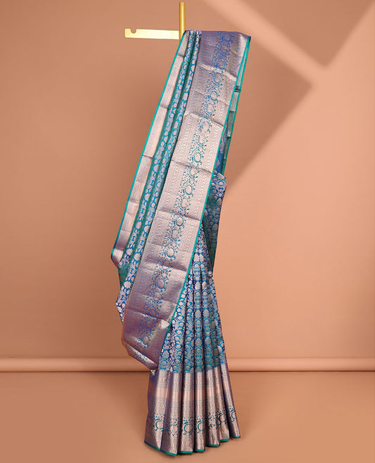 Blue floral jacquard kancheepuram silk saree with contrast border of rekku, muthu, kodi visiry design & zari design pallu