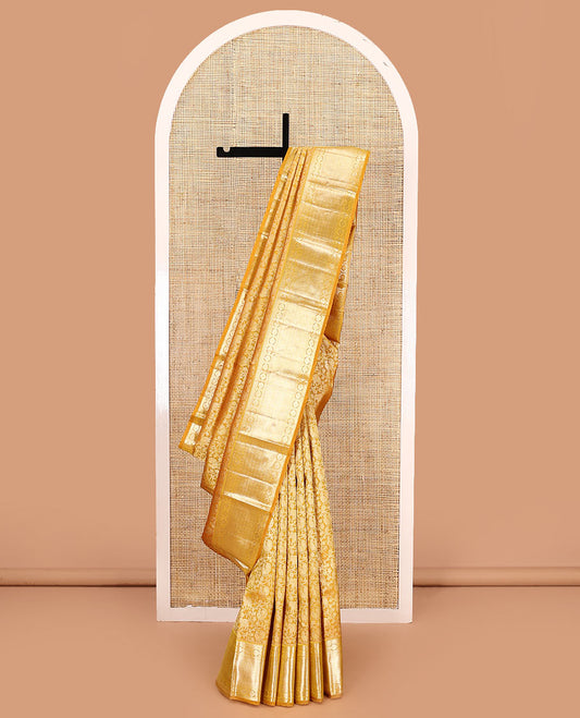 Yellow jacquard kanchipuram silk saree, zari border of rekku, neli, rudraksham, and jaal designs, and jaal pallu