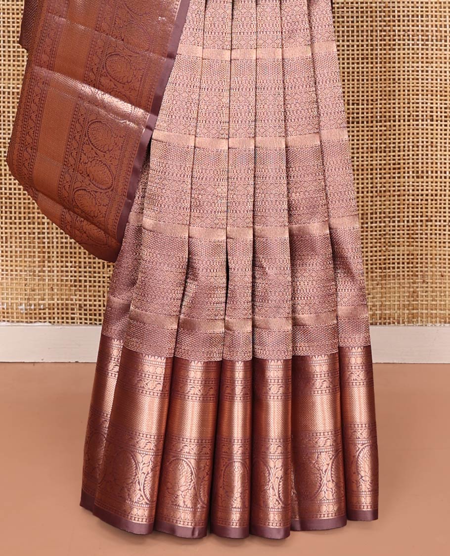 Rosewood Pink Kanchipuram Wedding Silk Saree, Embellished with Jacquard Design on Its Body, Highlighted by Zari Border of Rekku, Muthu, Rudraksham, Mayil Kann, and Kodi Visiry Designs, Grandly Decked up Pallu, and Paired with a Matching Blouse