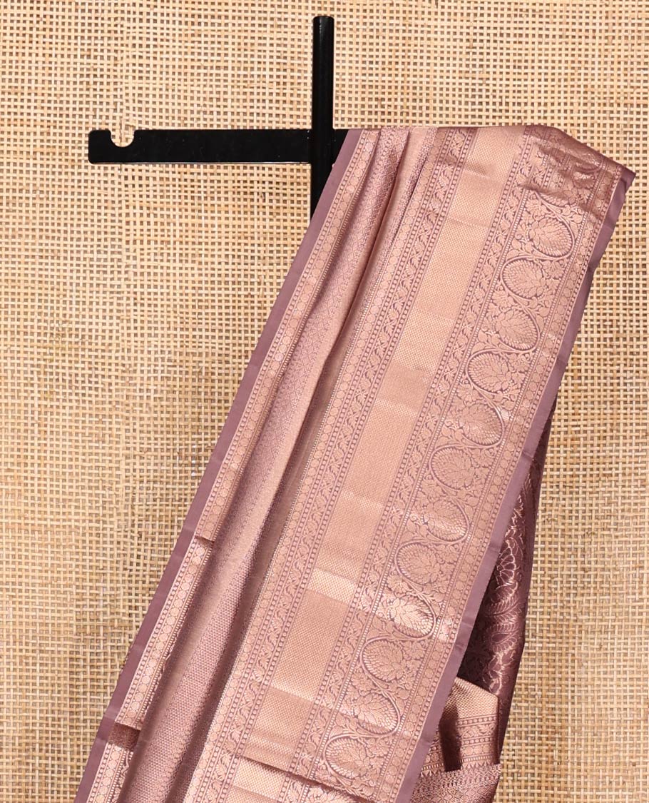 Rosewood Pink Kanchipuram Wedding Silk Saree, Embellished with Jacquard Design on Its Body, Highlighted by Zari Border of Rekku, Muthu, Rudraksham, Mayil Kann, and Kodi Visiry Designs, Grandly Decked up Pallu, and Paired with a Matching Blouse