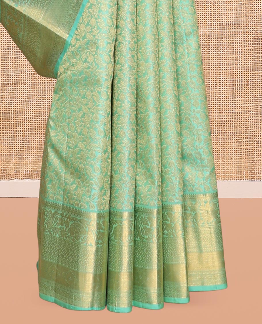 Turquoise Kanchipuram Wedding Silk Saree, Decorated with Jacquard Design, a Traditional Zari Border, Grand Pallu, and a Matching Blouse