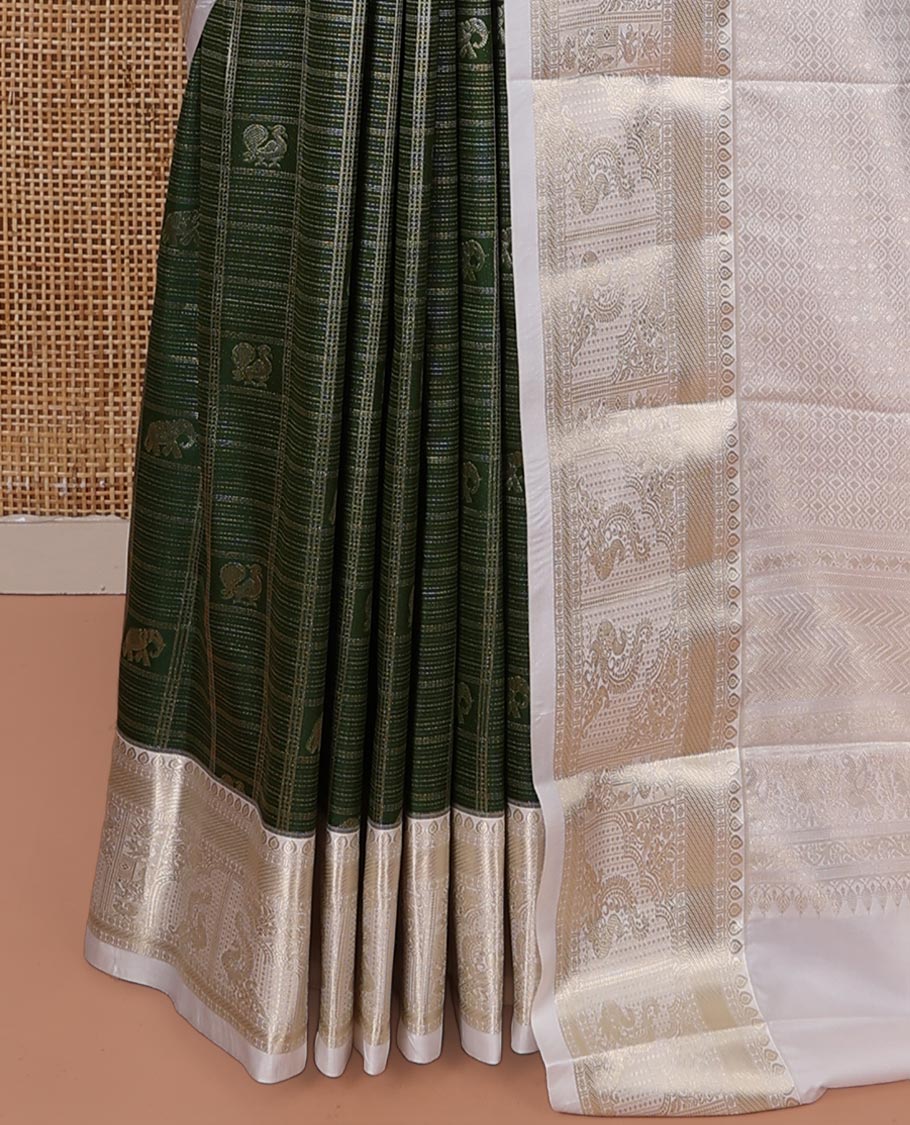 Green Budget Silk Saree, Mesmerized with Peacock and Elephant Motif Enclosed Checks, Complemented by a Contrast Traditional Zari Designs Woven Border, Pallu of Jaal Designs, and Paired with a Contrast Blouse