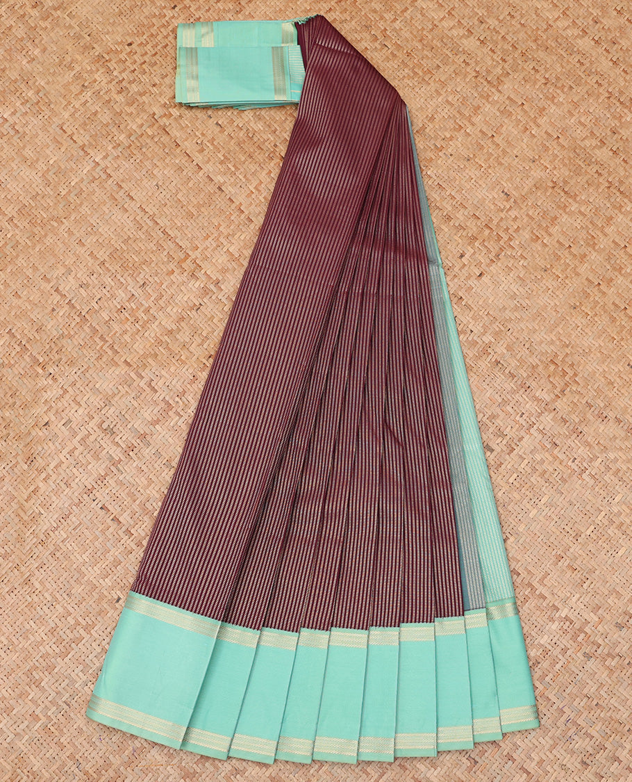 Maroon Budget Silk Saree, Gleamed Up with Zari Stripes, a Contrast Traditional Zari Rettai Pettu Border, Grand Pallu, and a Contrast Blouse