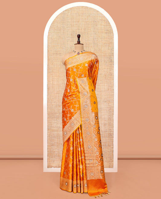 Yellow Banarasi Satin Saree, Delicately Woven with Floral Jaal Jacquard, a Floral Creeper Border, Intricate Stonework Pallu, and a Matching Blouse