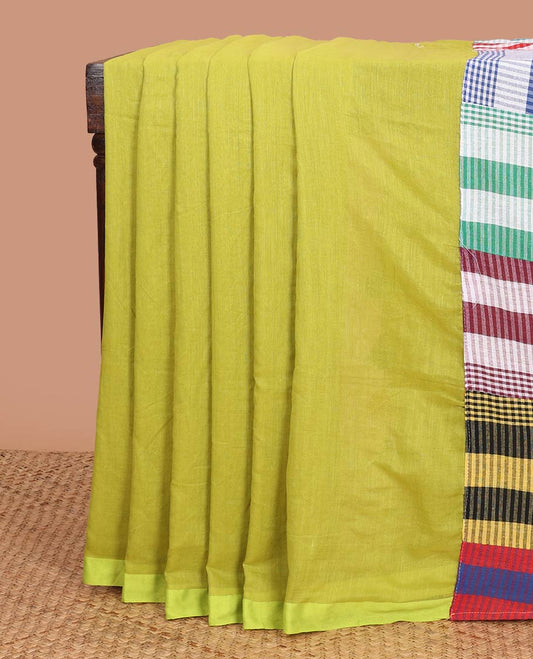 Borderless green plain khadi cotton saree, contrast kaleidoscope-colored patchwork style micro-checked pallu with colorful tassels