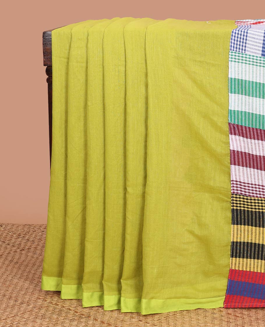 Borderless green plain khadi cotton saree, contrast kaleidoscope-colored patchwork style micro-checked pallu with colorful tassels