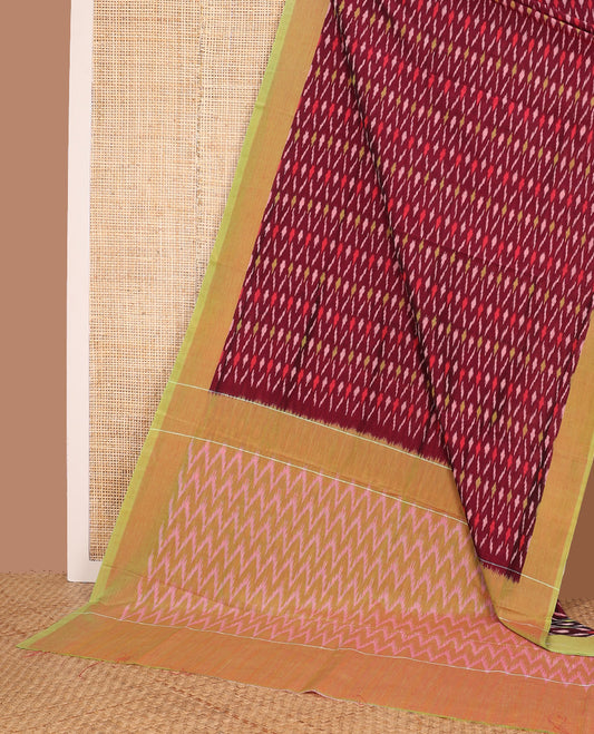 Maroon unique buttas woven ikkat cotton saree, contrast plain border, and pallu of chevron stripes