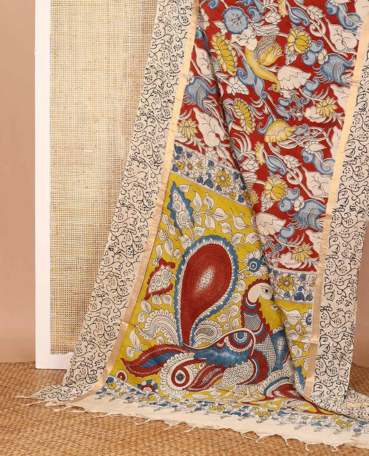 Maroon flora-fauna machine-printed Kalamkari cotton saree, contrast floral printed border, and pallu of big peacock print