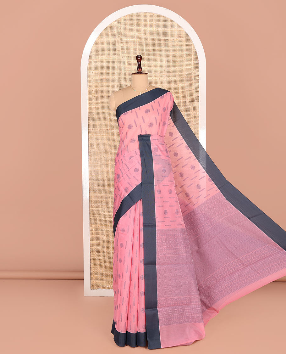 Pink Semi-Silk Cotton Saree, Subtly Sparkled with Buttas All Over Its Body, Complemented by Contrast Border, Pallu of Geometric Patterns, and Paired with a Matching Blouse