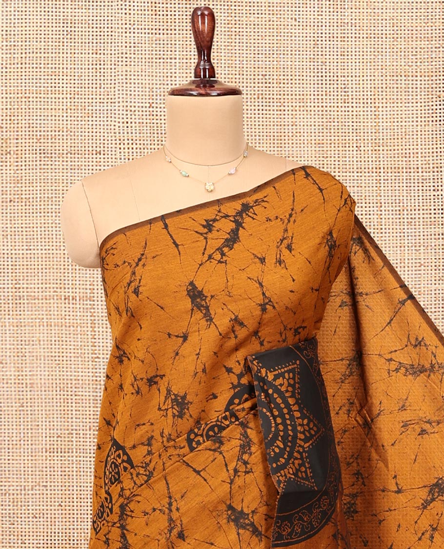 Borderless Yellow-Black Poly Cotton Saree, Decked Up with Batik Print, a Self-Printed Pallu, and a Matching Blouse