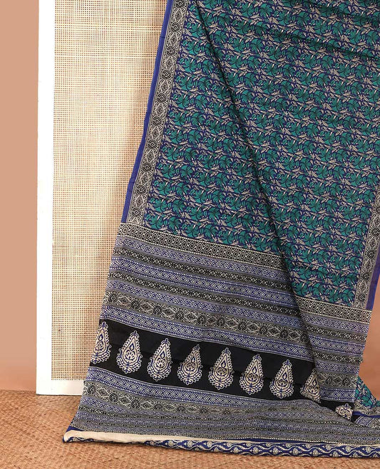 Blue floral printed mul mul cotton saree, contrast printed border, and pallu of intricate designs