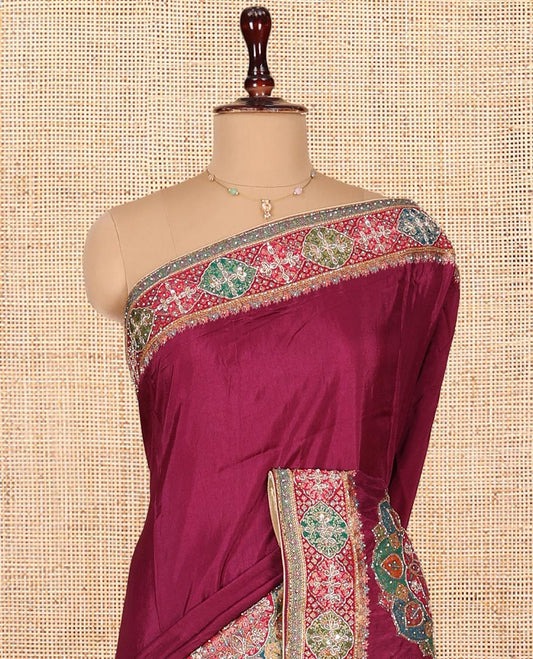 Wine Dola Silk Saree, Embellished with Rangoli-Style Colorful Embroidery on Its Body, Highlighted by an Embroidered Border, Pallu of Embroidery and Print Work, and Paired with a Matching Blouse