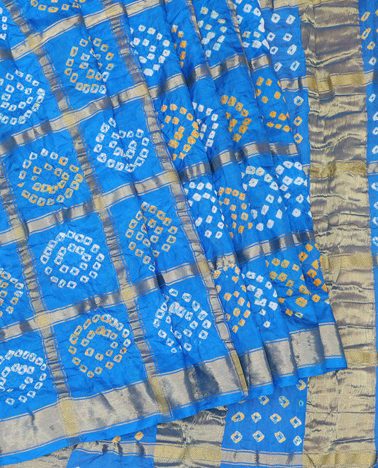 Royal Blue Bandhani Dola Silk Saree, Elevated with Bandhani Dots and Ghar Chola Checks, a Gleaming Zari Border, and a Matching Blouse