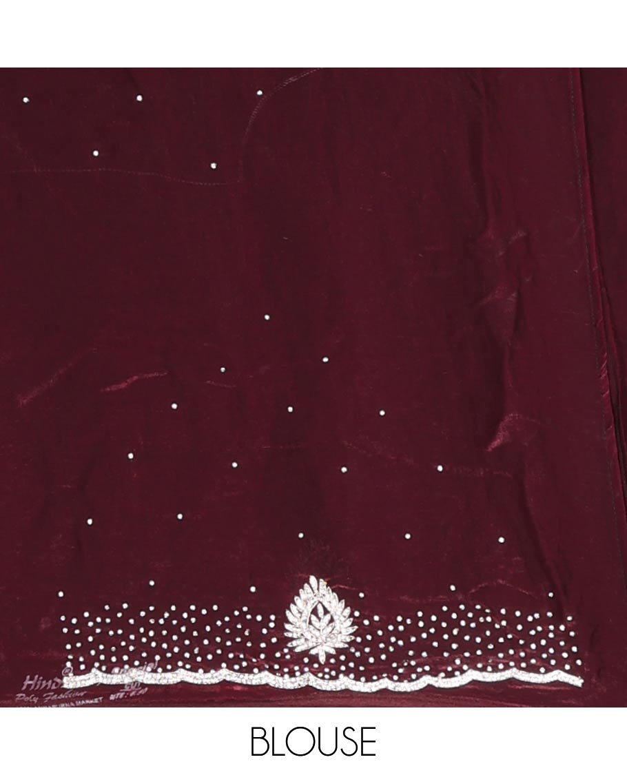 Maroon stone embroidered designer saree with unique motifs in embroidery, scallop stone work border