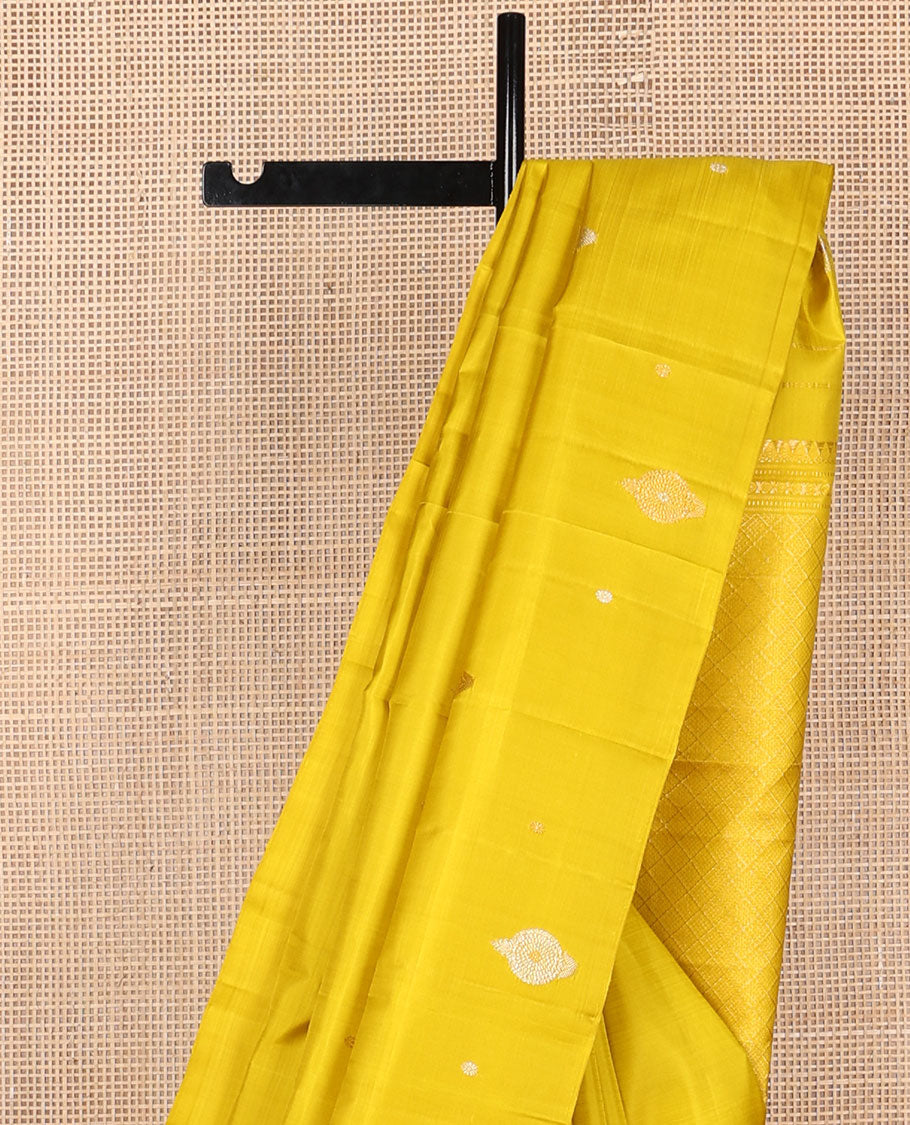 Borderless yellow zari buttas Kanchipuram silk saree, self-pallu of jaal designs
