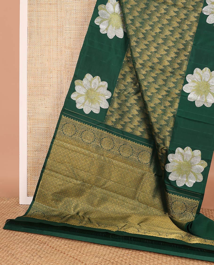 Green tree motifs Kanchipuram designer saree, big marigold floral motifs woven border, and jaal pallu