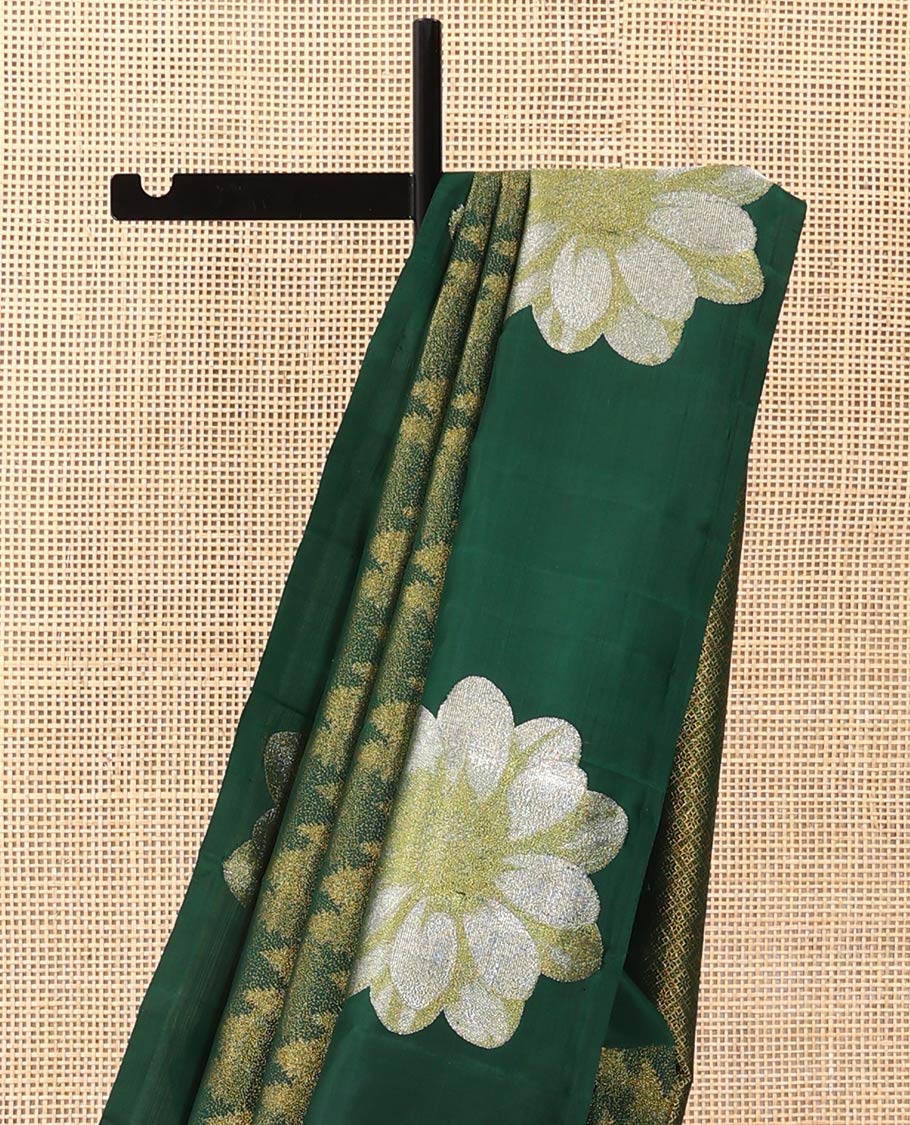 Green tree motifs Kanchipuram designer saree, big marigold floral motifs woven border, and jaal pallu