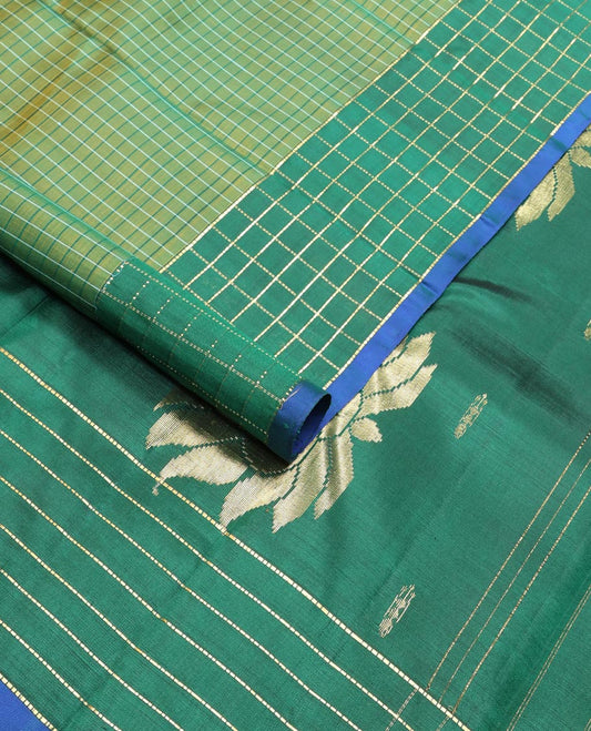 Green checked, buttas kancheepuram silk saree with contrast checked border & striped, floral design pallu