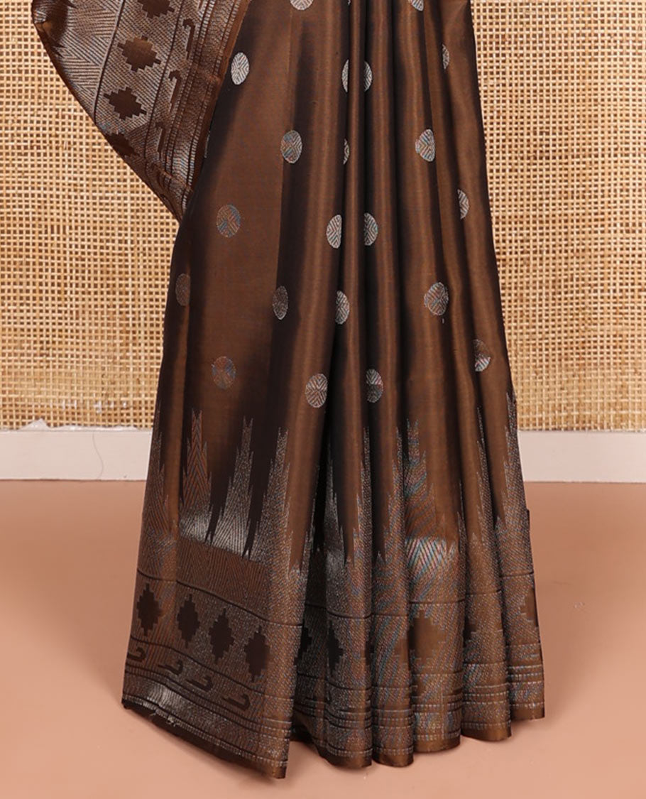 Brown rudraksham buttas soft silk saree, temple geometric patterned border of muniya designs, and intricate pallu