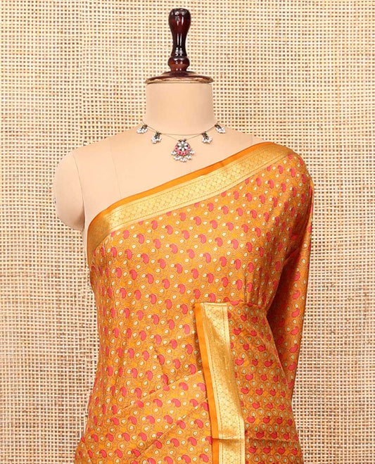 Orange Printed Silk Saree, Steeped with Paisleys, a Traditional Zari Border, Geometric Patterned Pallu, and Matching Blouse