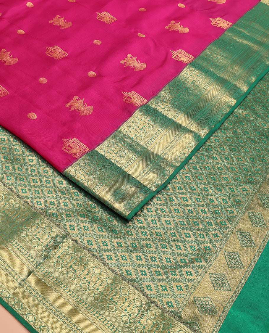 Magenta Vasundhara Lite Silk Mix Saree Enthralled with Mayil, Iruthalai Pakshi, and Chakram Designs, Highlighted with a Contrast Border of Mayil, Kamalam, Mayil Kann, Manga, Rudraksham, and Vanki Designs, Zari Elevated Jaal Pallu, and a Contrast Blouse