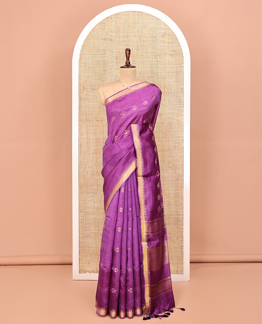 Purple Banana Pith Saree, Adorned with Zari Buttas All Over Its Body, Highlighted by Temple Zari Border, Subtly Striped Pallu, and Paired with a Matching Blouse