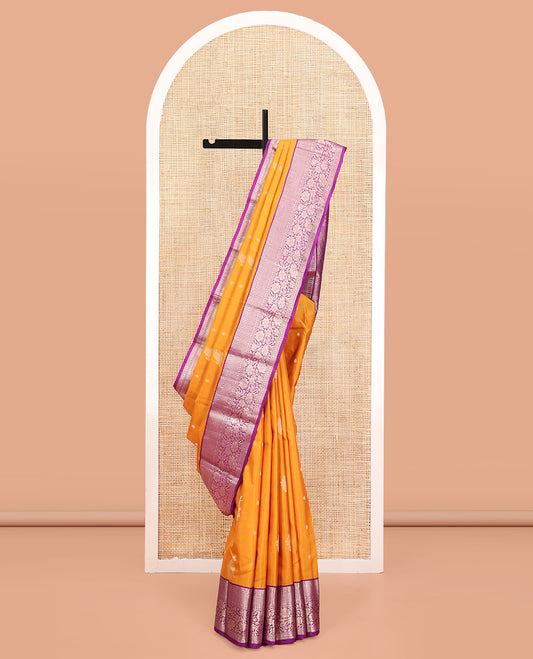 Yellow Vasundhara Silk Saree, Subtly Enriched with Zari Buttas All Over Its Body, Complemented by Contrast Border of Neli, Muthu, Poun, and Kodi Visiry Designs, Grand Pallu, and Paired with a Contrast Blouse