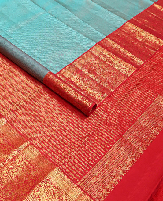 Blue striped wedding silksaree, contrast border of thilakam,banaras,muthu,mayil kann,mayil,kili & yaanai & leaf vine pallu