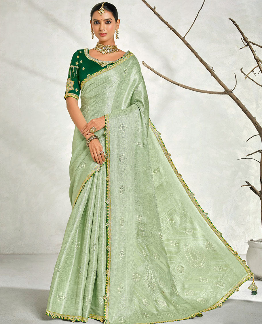 Green ogee embossed & stonework designer saree, traditional design & lace work scallop border & intricate stonework pallu