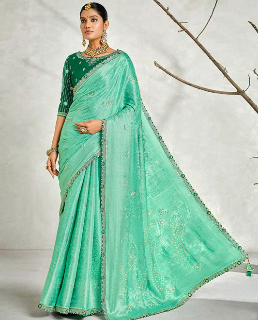 Turquoise floral embossed & stonework designer saree, traditional design & lace work scallop border & intricate stonework pallu