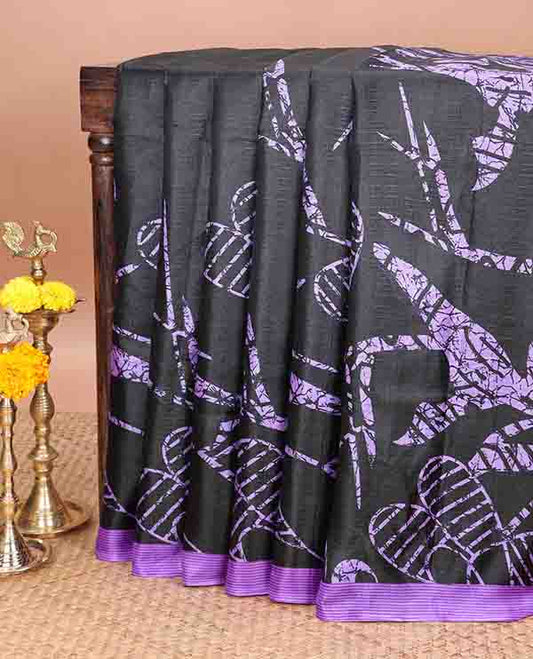 Borderless black printed orchid design semi khadhi saree with printed self, tussels pallu, purple border & all over dotted blouse (Copy)