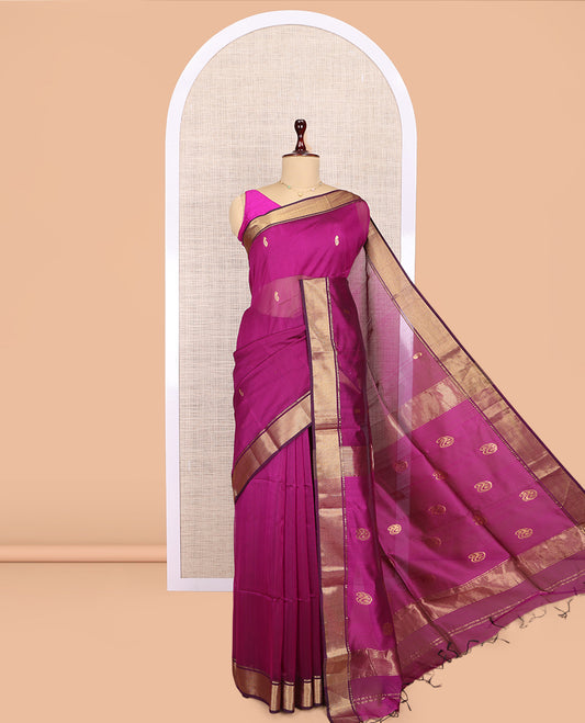 Magenta Maheshwari Cotton Saree, Graced with Buttas, Highlighted by a Semi-Contrast Traditional Zari Border, Pallu of Paisleys, and a Matching Blouse