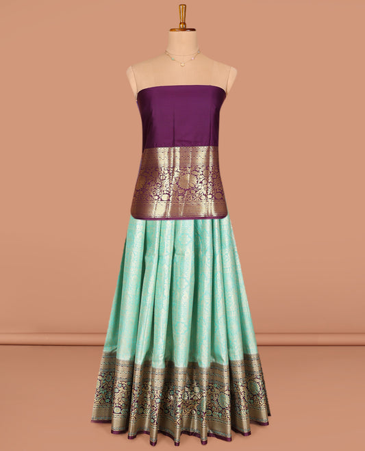 Turquoise Art Silk Pavadai Material Set, Meticulously Crafted with Jacquard Designs on Its Skirt, Complemented by a Contrast Floral Zari Meenakari Design Border, and Paired with a Contrast Blouse