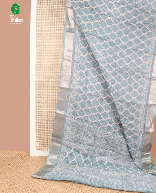 Green printed dola silk saree with zari border & printed pallu along with printed blouse